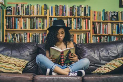 Young woman reading a book