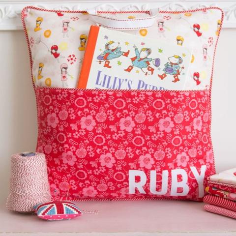 Image of a white and red book pillow