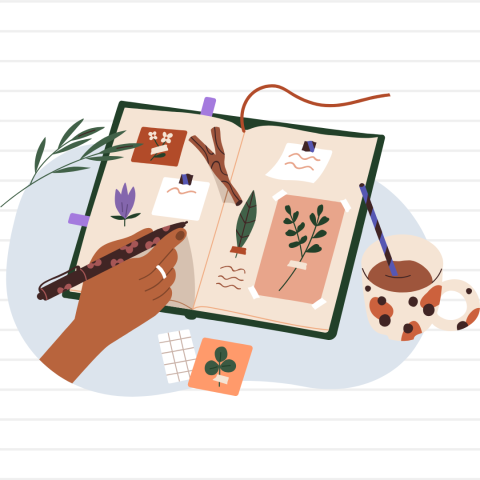 Hand writing in a journal.