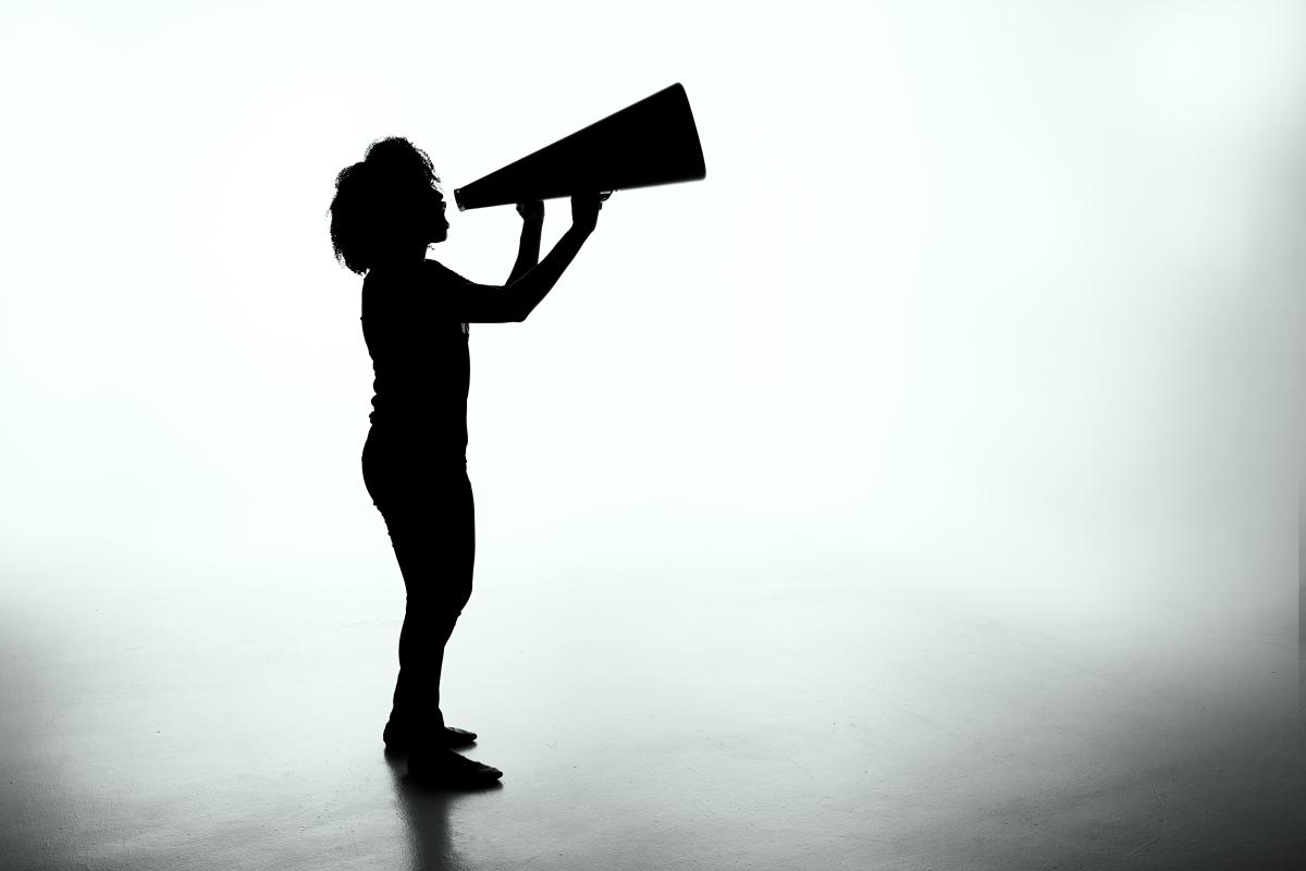 Woman speaking into megaphone