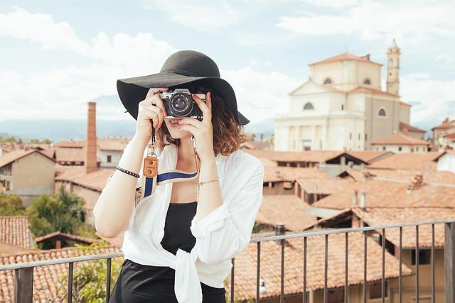 Woman taking photograph