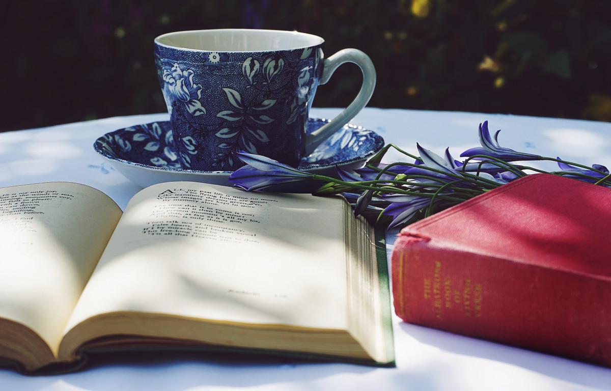 Book of poetry and a cup of tea