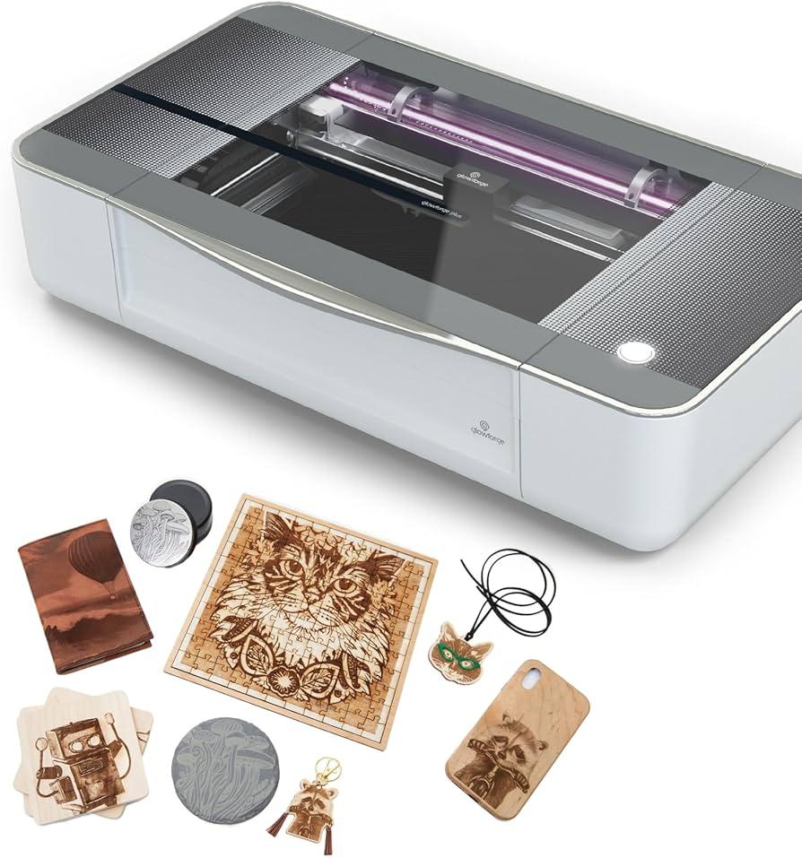 Glowforge Laser Cutter with some example pieces around it.