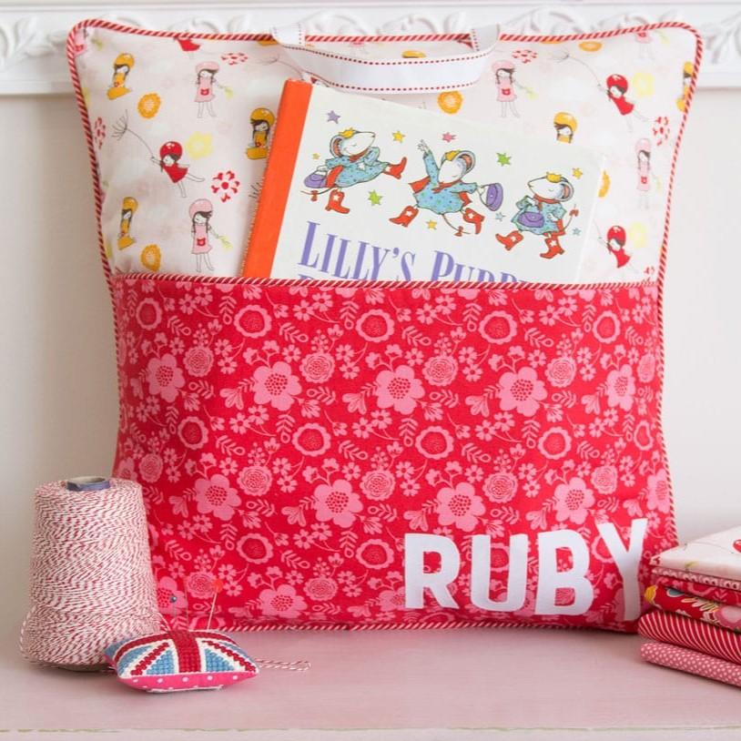 Image of a white and red book pillow